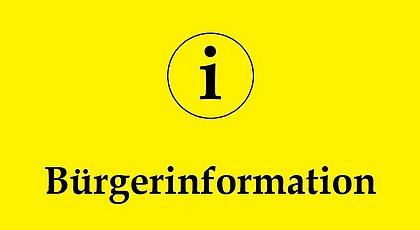 Auf dem Foto ist auf gelbem Grund mit schwarzer Schrift das Wort „Bürgerinformation“ zu lesen. 